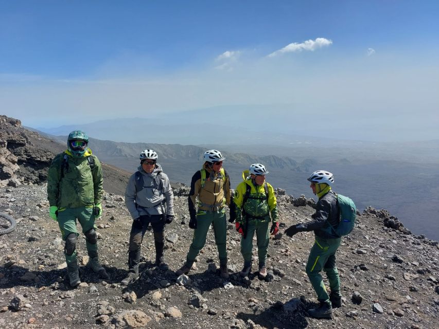 Mount Etna: Summit Cycling Tour - The summit climb: dirt paths, lava flows, and views back down