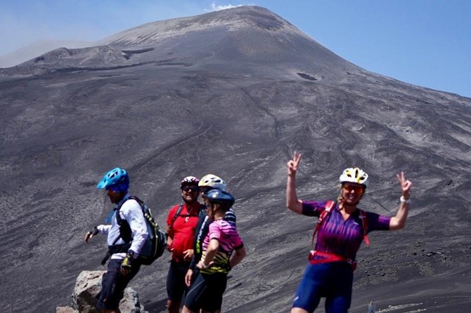 Mt. Etna Cycling to the Top small group - The ride through lava, black sand, and pine woods