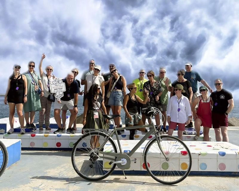 Palermo: Guided Bike Tour with Street Food Tasting - Port of Cala and the First Arab Castle Stop