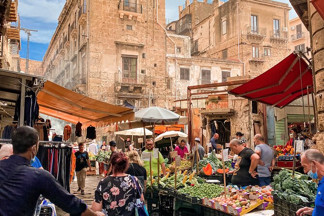 Palermo Private Street Food Tour: A Culinary Journey with a Chef - Vucciria market finish: cannolo and zibibbo with real street energy