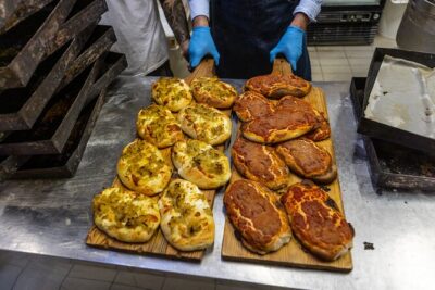 Palermo Street Food & Market Tour by Eating Europe - Ballarò’s doorway moment: the Arch of Cutò
