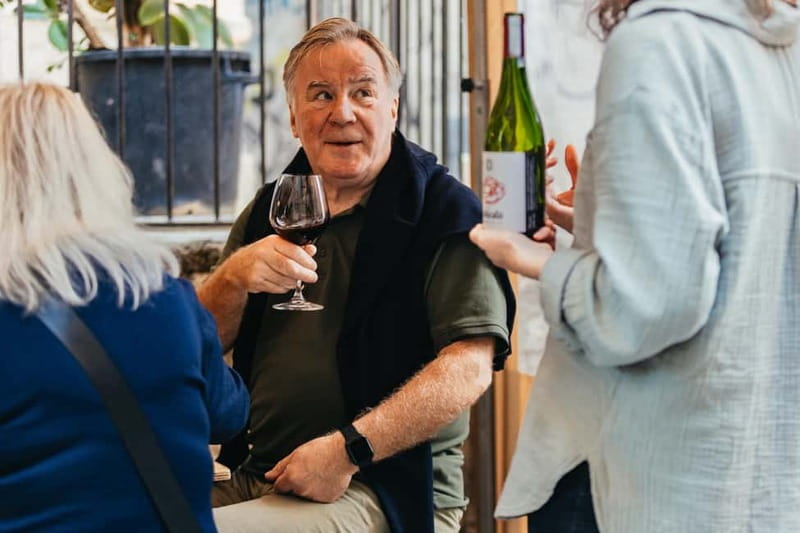 Palermo: Wine Tasting with Snacks at Bottega Monteleone - Entering Bottega Monteleone: A Palermo Wine Bar You Can Hear Smiling
