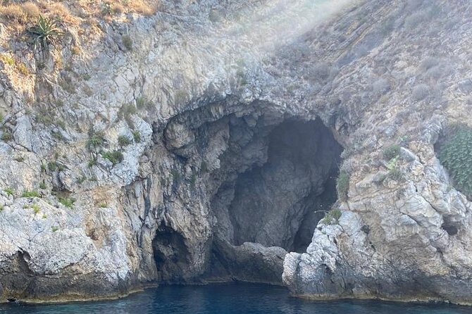 Private boat tour Giardini Naxos Taormina with platter and wine - Watching Taormina from the sea: more than pretty views
