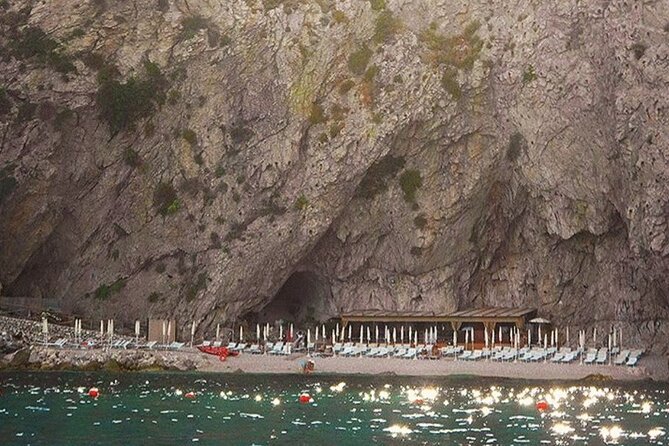 Private boat tour Giardini Naxos Taormina with platter and wine - Corso Umberto, Piazza IX Aprile, and Bam Bar energy—seen from water