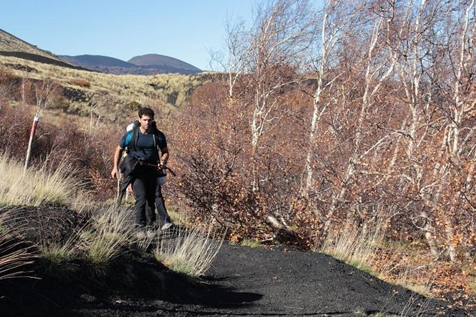 Private Etna Trekking half day tour from Taormina - Grotta dei Tre Livelli: a short lava-cave visit with helmets and lamps