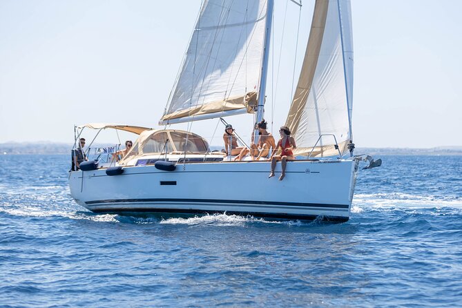 Private Sail Boat Tour to Favignana and Levanzo from Trapani - Stop 1: Scogliera Cala Azzurra for the long first swim window