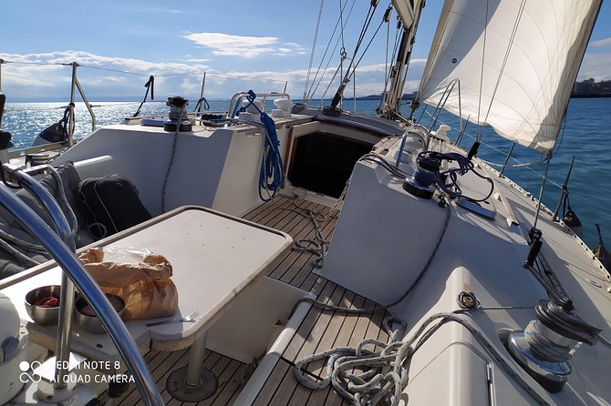 Sailing tour at sunset in catania - Stop 3: Ognina’s lava flows and Etna views from the water
