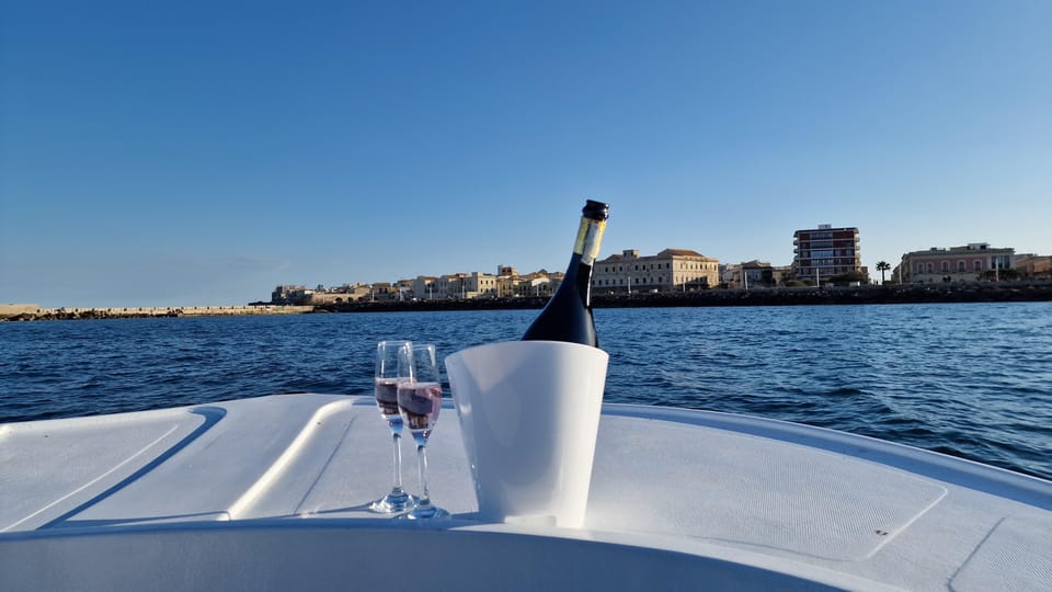 Siracusa: Ortigia & Sea Caves Boat Tour with Sunset Apertif - Key highlights worth your attention