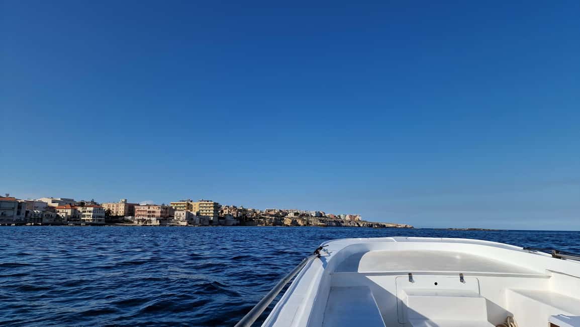 Siracusa: Ortigia & Sea Caves Speedboat Tour with Swim Stop - Guides, Music, and the Sound of the Sea