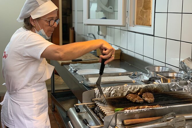 Street food tour of Catania by night - Via dei Crociferi after dark: slow walking with stories