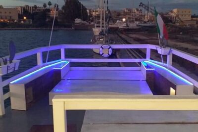 Sunset boat tour with aperitif and swimming break - Passing Castello Maniace: The View Stop That Sets the Mood