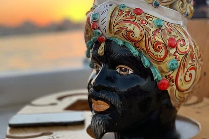 Syracuse Aperitif boat at Sunset island and sea caves - A short boat ride that hits Ortigia’s caves at golden hour