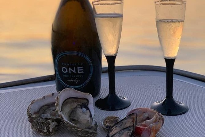 Syracuse Aperitif boat at Sunset island and sea caves - Grotta delle Stallatiti, prosecco, and a swim near Maniace Castle