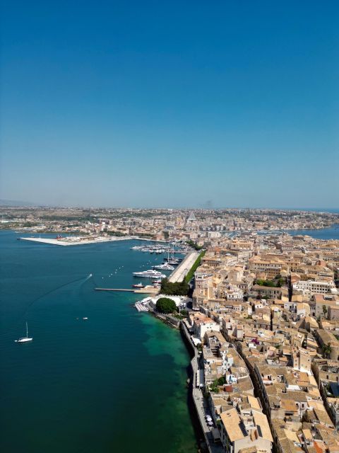 Syracuse: Boat tour Ortigia island,seacaves and Explanations - Syracuse Sea Caves: Where the Boat Maneuvers Up Close