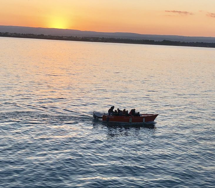 Syracuse: Boat Trip of Ortigia Island and Sea Caves - Cruising past the Port of Syracuse and the Alfeo Promenade