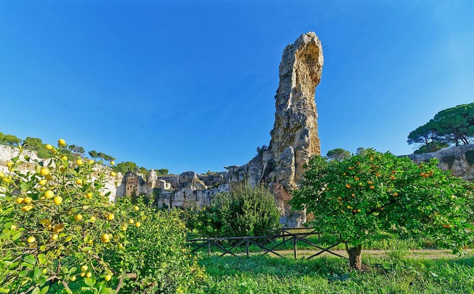 Syracuse: Greek Theater and Neapolis sunset tour - Roman Amphitheater and gladiator stories: performance history in the open air