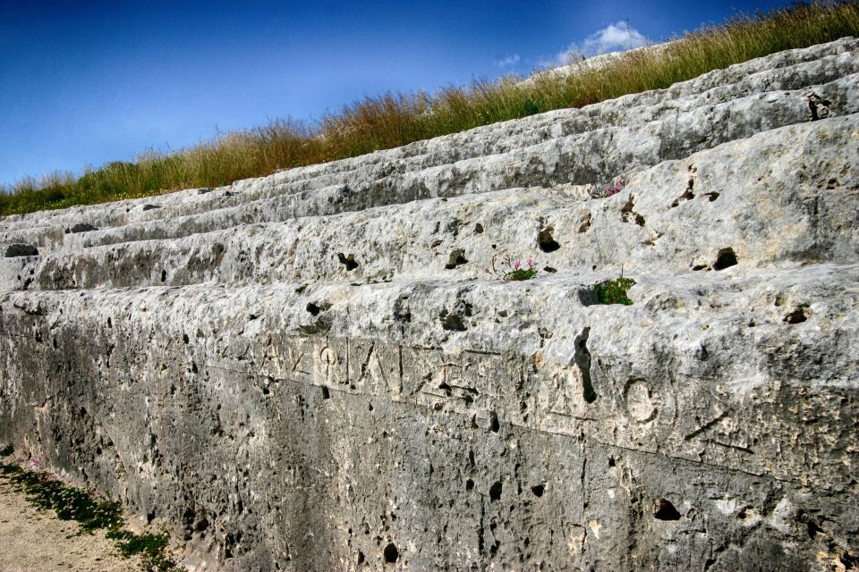 Syracuse: Neapolis Archaeological Park Small Group Tour - Greek theatre and Temenite Hill views: the bay is part of the monument