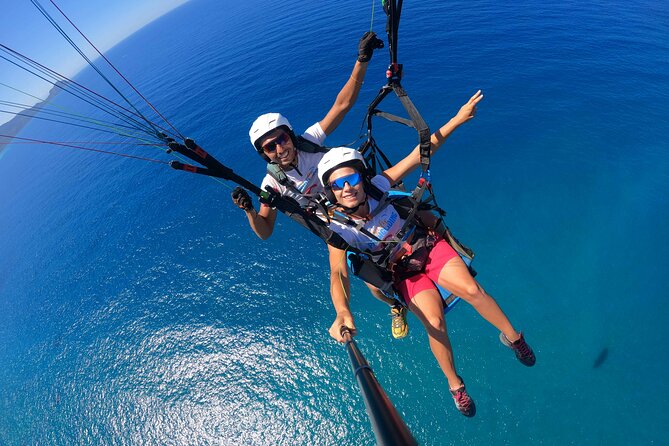 Tandem Paragliding Flight in Taormina - Landing and the Micro SD Card Moment