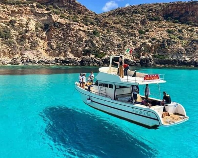 Taormina: Boat Tour with Aperitif on Isola Bella - Sailing the Taormina coastline: bays, marine reserve vibes, and dolphin hopes