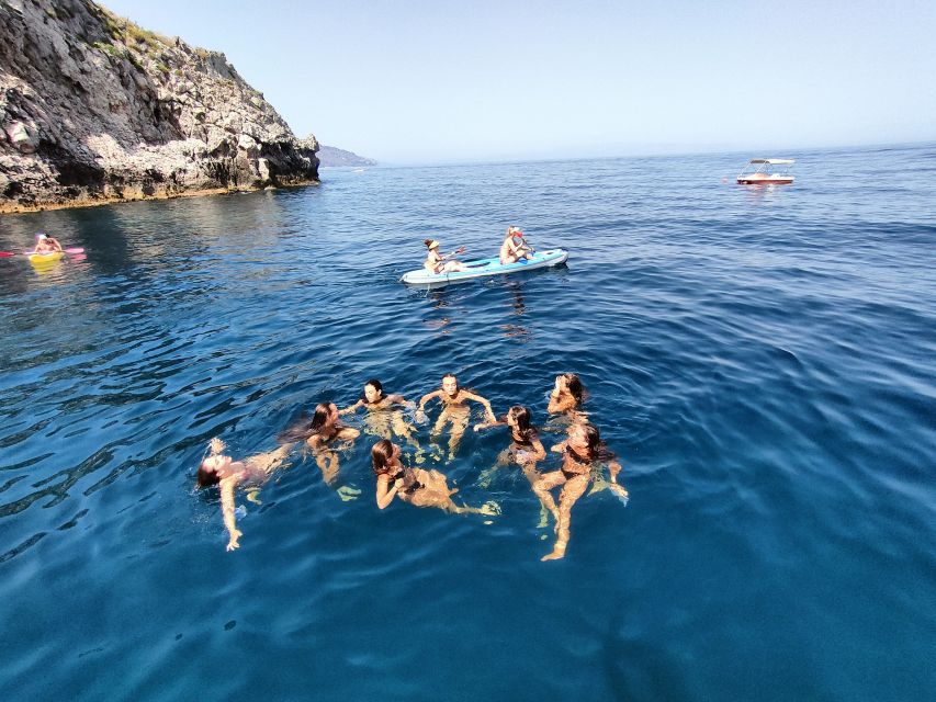 Taormina: Coastal Highlights Cruise with Wine & Food Tasting - The Water Breaks: Swimming, Snorkeling, and Caves (Without Any Hard Sell)
