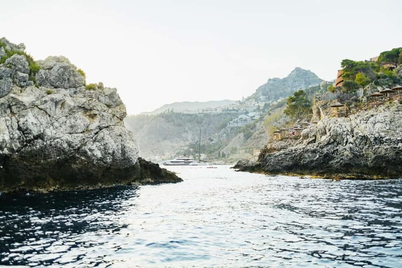 Taormina: Sunset Boat Tour with Dolphin Watching & Aperitif - Dolphin watching with ~80% odds: how to make it count