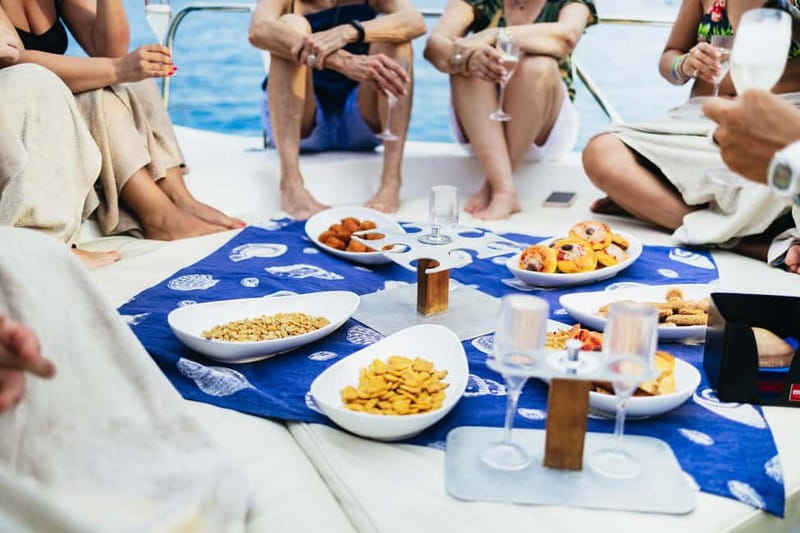 Taormina: Sunset Boat Tour with Dolphin Watching & Aperitif - The Isola Bella swim or snorkeling stop: the clearest reward