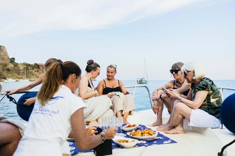 Taormina: Sunset Boat Tour with Dolphin Watching & Aperitif - Aperitif on board: snacks, drinks, and real hospitality