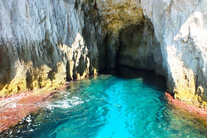 Tour of the island of Ortigia and exploration of sea caves with baths. - Skirting Ortigia: Duomo Views, Spanish Walls, and Porta Marina