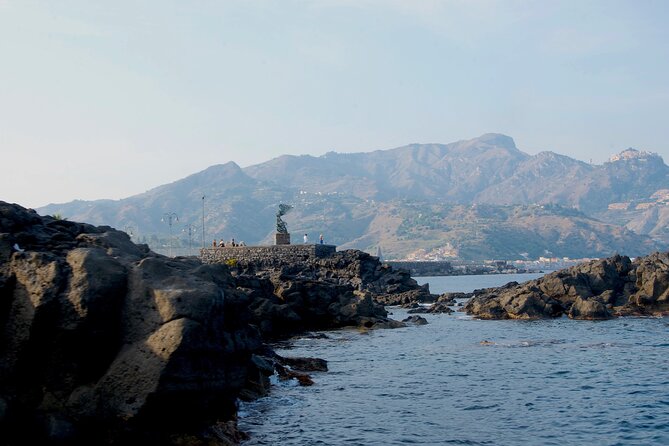 Tour to Baia di Taormina, Isola Bella and Naxos - Stop 2: Giardini Naxos Bay for beaches, snorkeling, and relaxed time on the water
