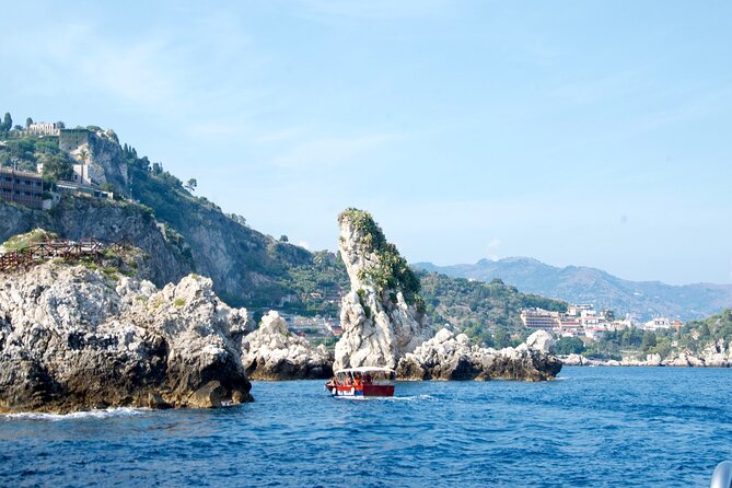 Tour to Baia di Taormina, Isola Bella and Naxos - Onboard vibe: open bar, restroom, and captain-led music