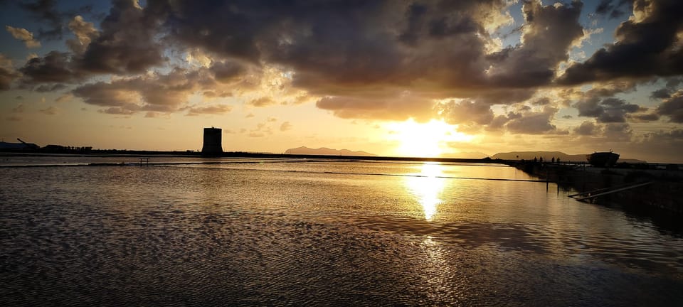 Trapani: Salt Pans Sunset Tour and Flamingo Way - First salt-pan photo stop: using the light at Trapani Salt Pans